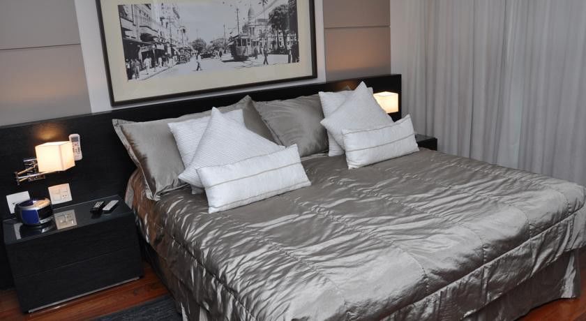 Constantino Hotel E Eventos Жуис-ди-Фора Экстерьер фото A bed with a duvet